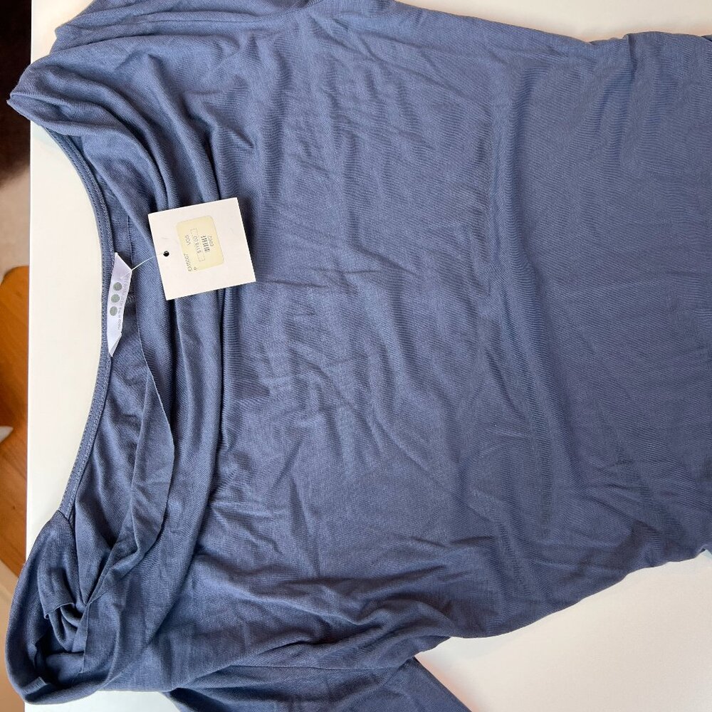 92% Viscose, 8% Spandex fitted dress from Two Birds boutique, size X-Small